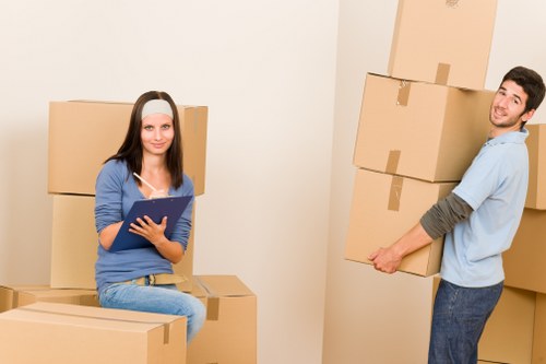 Packed boxes and labelled items ready for local removals